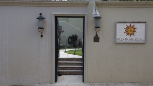 A building entrance with a sign reading "Villa Pajaro De Sol". - Lake Front (Ajijic)