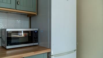Apartment, Multiple Beds | Private kitchen