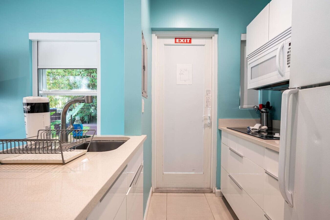 Fridge, microwave, stovetop, coffee/tea maker