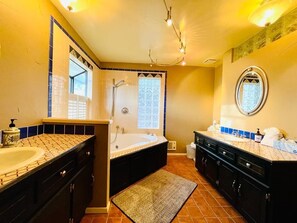 Combined shower/tub, hair dryer, towels, soap