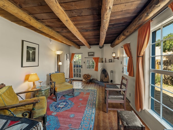 TV, fireplace, books, printers
