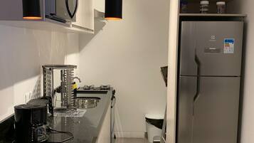 Basic Apartment | Private kitchen | Coffee/tea maker, full-size fridge, microwave, toaster