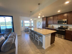 Fridge, microwave, oven, stovetop - Sunny condo with golf course and lake views! (Bradenton)