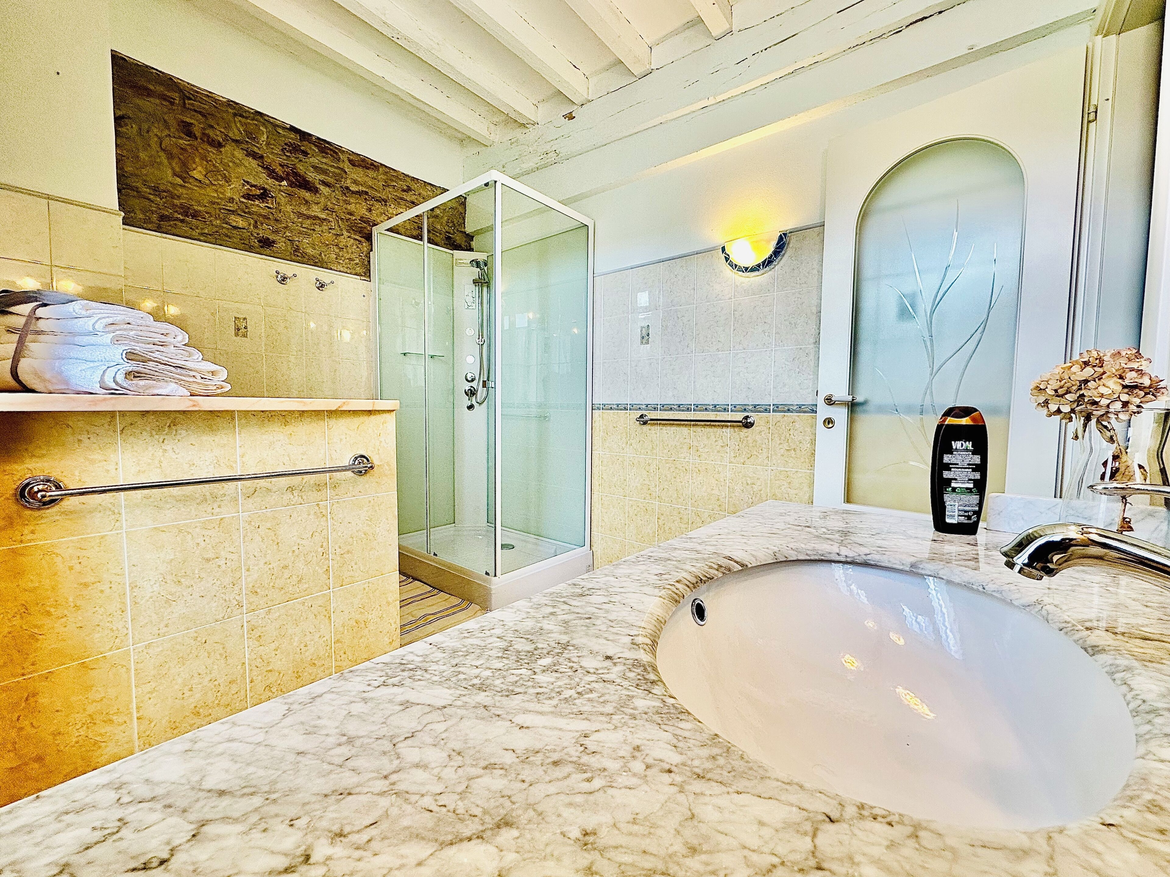 Combined shower/tub, jetted tub, hair dryer, bidet