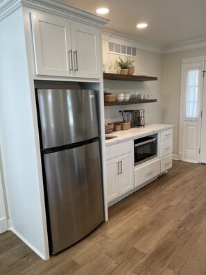 Fridge, microwave, coffee/tea maker, toaster