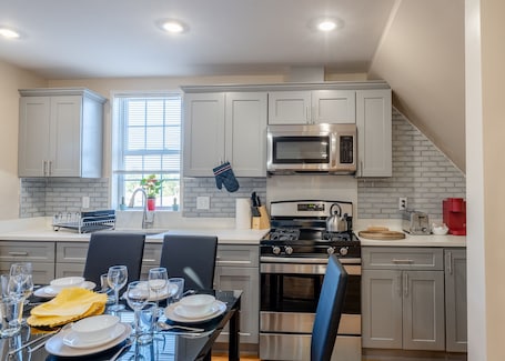 Fridge, microwave, oven, stovetop. Spacious 4BR Boston Stay Near Franklin Park Zoo • Parking • Pet-Friendly - 233/3