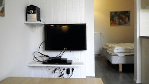 Apartment (Schmugglerstieg 9c - Dorf 5) | Living room | TV, fireplace - Schmugglerstieg 9c - Dorf 5 (Lübeck)