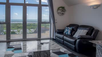 32-inch flat-screen TV with cable channels, Smart TV