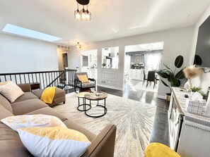 Smart TV, fireplace, books, offices