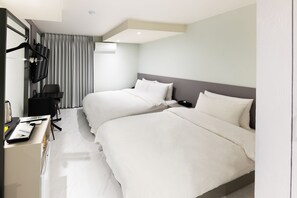 Cubrecamas, sistema de insonorización, wifi gratis y ropa de cama