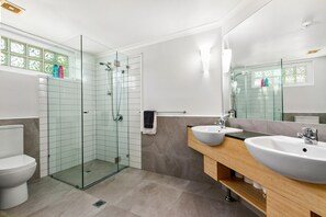 Bathtub, hair dryer, towels