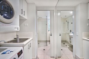 Shower, hair dryer, towels