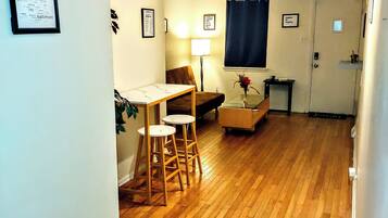 Shared Dormitory, 1 Bedroom, Smoking, Patio | Living room | Books