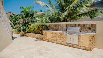 Apartment, 4 Bedrooms, Balcony, Garden View | BBQ/picnic Area