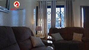 Departamento, 2 habitaciones, para fumadores, balcón | Sala de estar