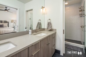 Hair dryer, towels, shampoo, toilet paper