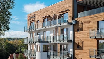 Experience the hotel's contemporary design with clean lines and expansive windows, offering stunning views of the surrounding area.
