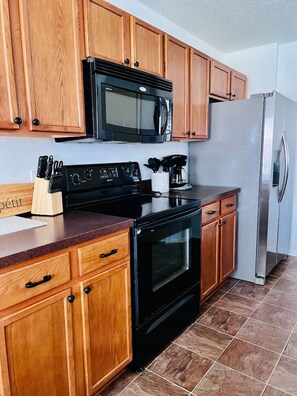 Fridge, microwave, oven, stovetop - Cozy 3 Bedroom House with Beautiful Fireplace (McKinney)