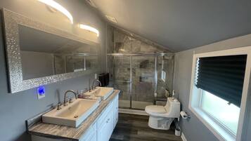 Shower, hair dryer, towels, soap