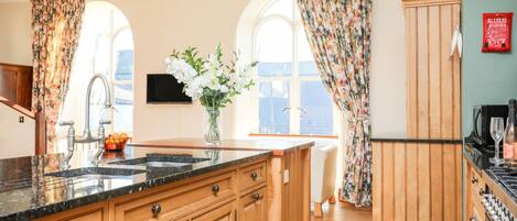 Fridge, dishwasher, electric kettle, cookware/dishes/utensils