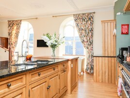 Fridge, dishwasher, electric kettle, cookware/dishes/utensils