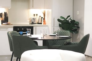Apartment, 2 Bedrooms | Private kitchen | Full-size fridge, microwave, oven, dishwasher