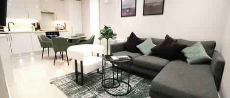 Apartment, 2 Bedrooms | Living area | 42-inch TV with satellite channels