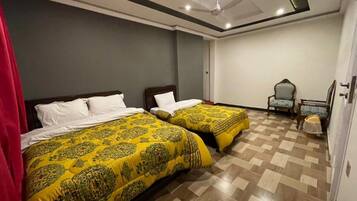 Deluxe Triple Room | Iron/ironing board, free WiFi, bed sheets