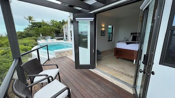 Outdoor pool, an infinity pool, pool loungers