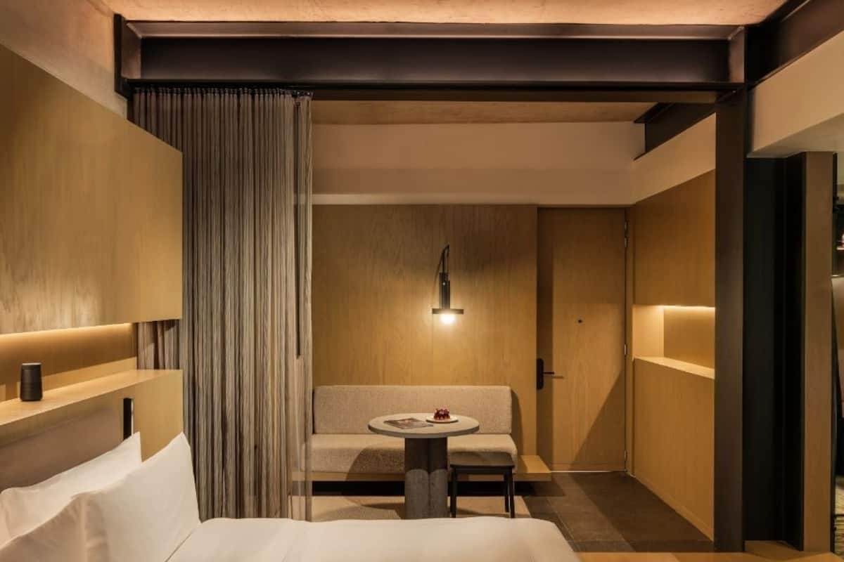 Suite, 1 King Bed | Living area | 50-inch Smart TV with cable channels, TV