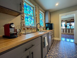 Fridge, microwave, stovetop, coffee/tea maker