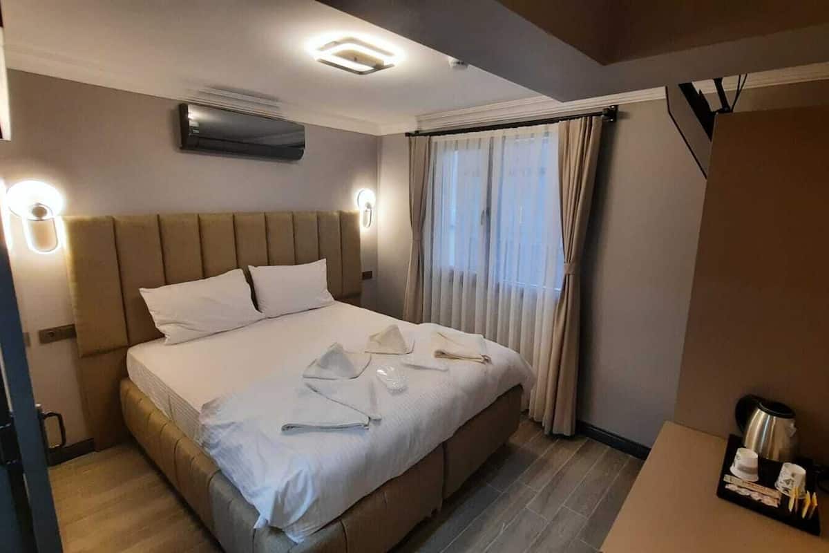 1 bedroom, laptop workspace, blackout curtains, iron/ironing board