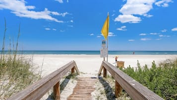 On the beach, sun loungers, beach towels