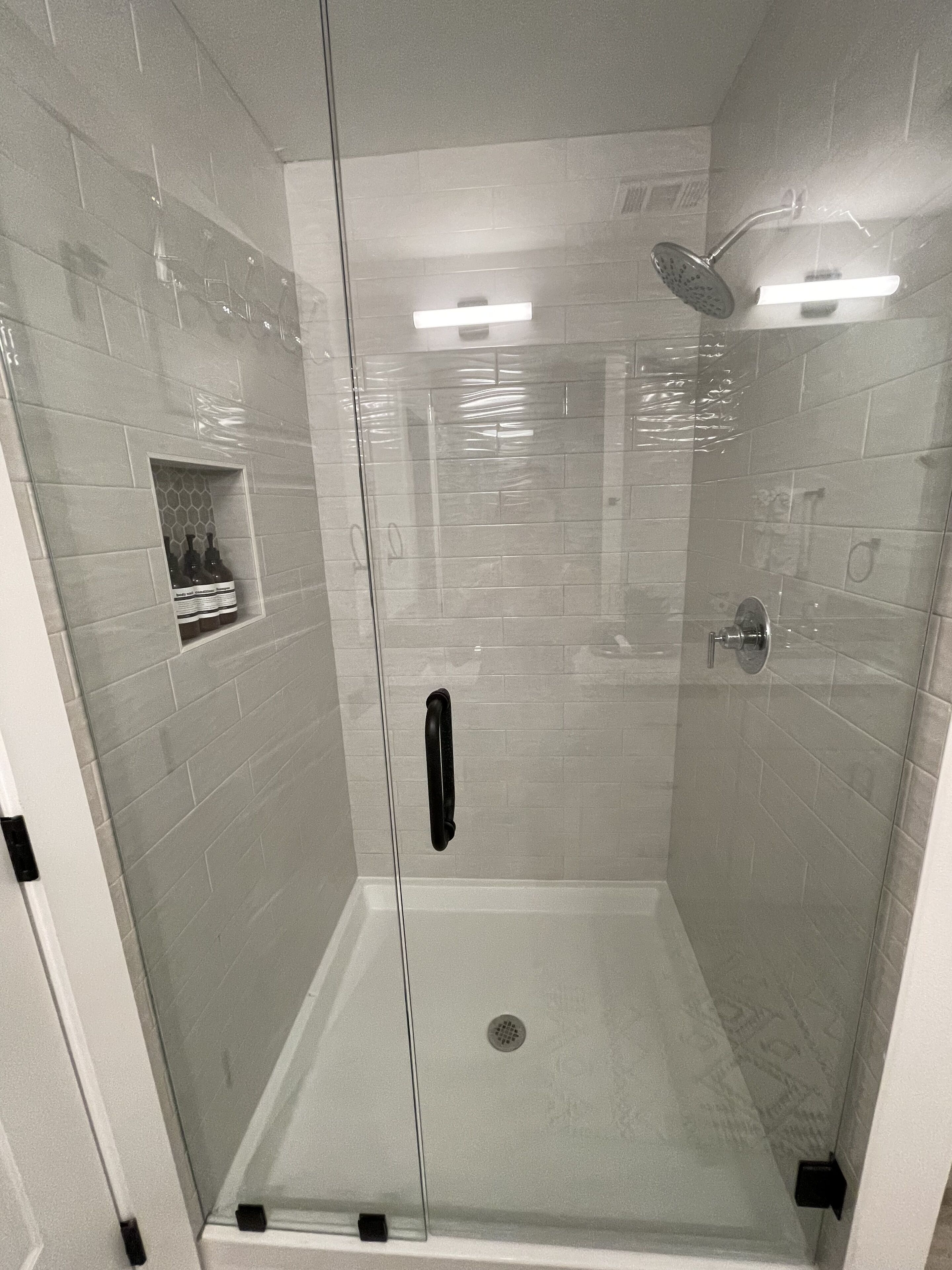 Bathtub, hair dryer, towels, soap