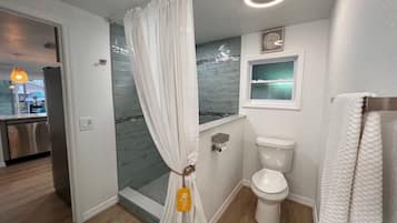 Hair dryer, towels, soap, toilet paper