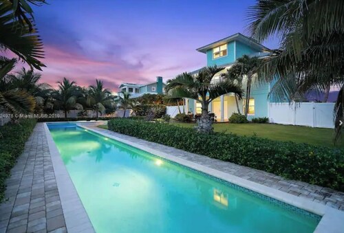 Stunning 4/3 w/ Heated Pool, Water View & Arcade!