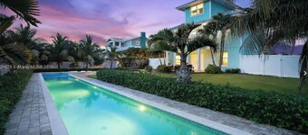 Stunning 4/3 w/ Heated Pool, Water View & Arcade!