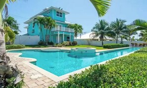 Outdoor pool - Stunning 4/3 w/ Heated Pool, Water View & Arcade! (Jensen Beach)