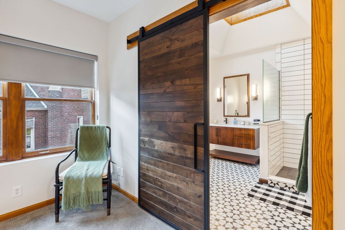You can see here the overhead skylight, naturally lighting the master bathroom. 