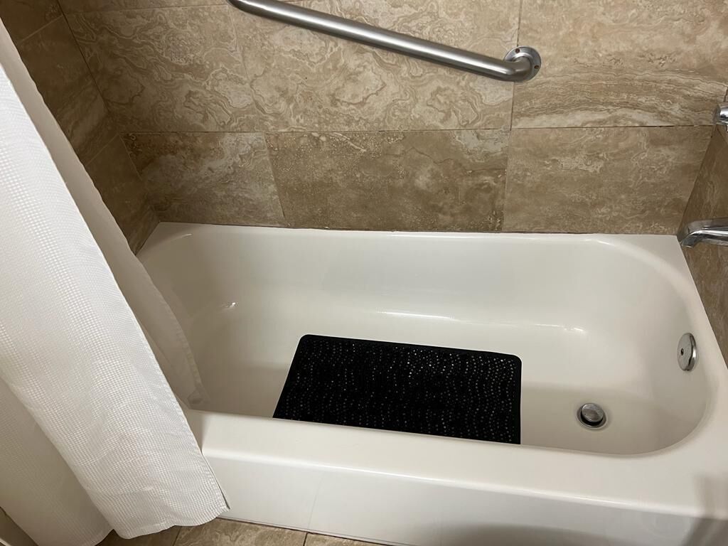 Combined shower/tub, hair dryer, towels, soap