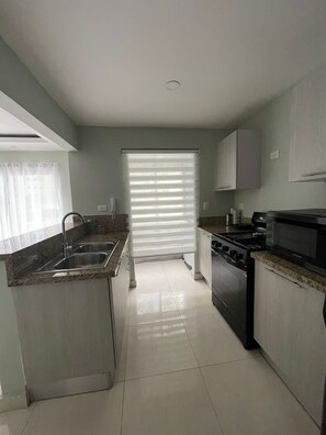 Private kitchen - Cozy apartment in the North Zone of Santo Domingo. (Santo Domingo Norte)