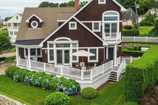 Custom Beach Home situated perfectly for ocean views! Professionally landscaped.