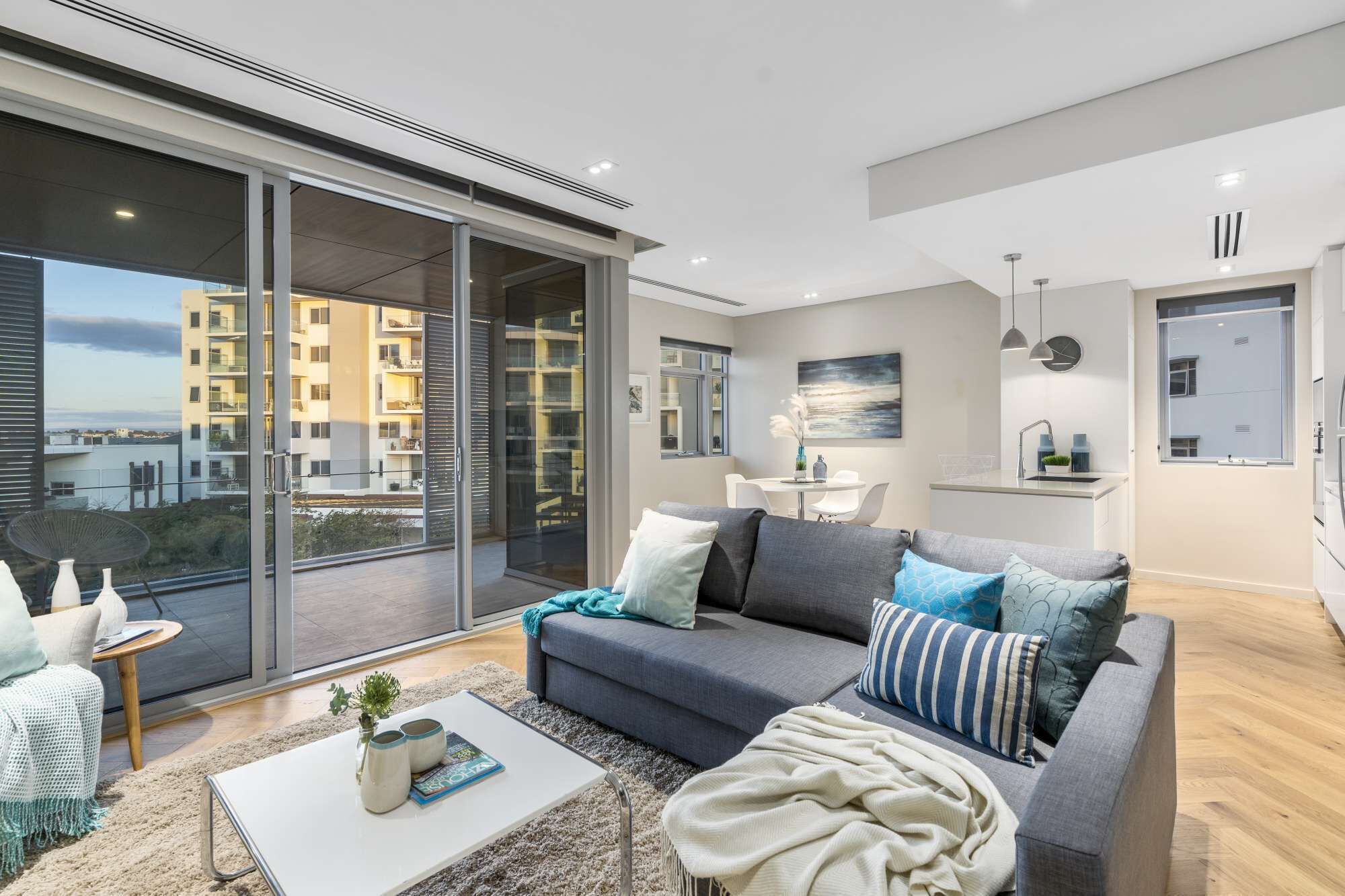 Stylish 1BR coastal apartment in high-end complex with pool and gym