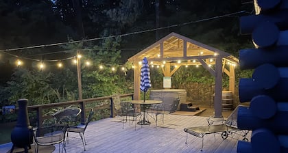 Century-old log cabin! Hot tub, game room, firepit, 5 min from Pigeon Forge