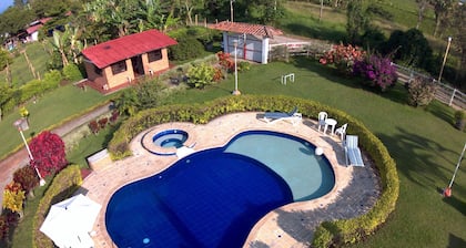 Tourist property with swimming pool, green areas. Near the coffee park