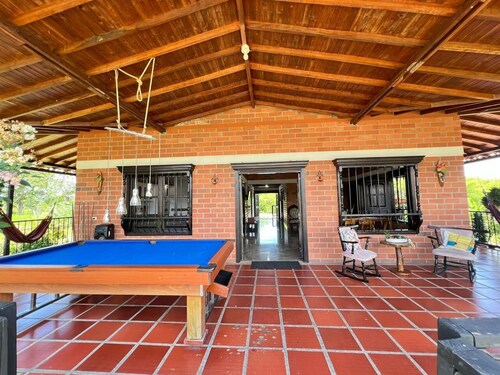 Tourist property with swimming pool, green areas. Near the coffee park