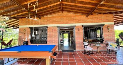 Tourist property with swimming pool, green areas. Near the coffee park