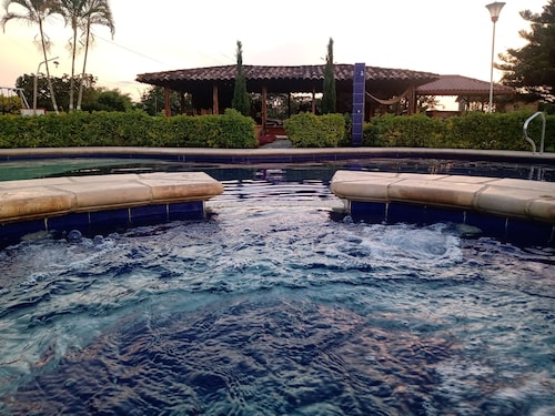 Tourist property with swimming pool, green areas. Near the coffee park