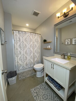 Combined shower/tub, hair dryer, towels, soap - Steps from KU, Private Guest Suite & Game Room (Lawrence)