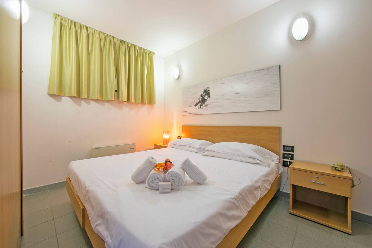 1 habitación y ropa de cama